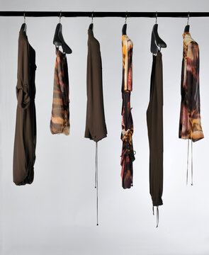 Elegant and trendy women's clothes hanging