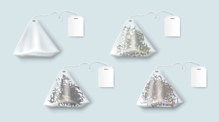 Tea bags with green and black leaves and herbs. Vector realistic set of transparent triangle teabags with blank white tag on string. Empty 3d sachet isolated on blue background