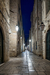 Old City of Dubrovnik. Narrow street of medieval town at night, Dalmatia Croatia