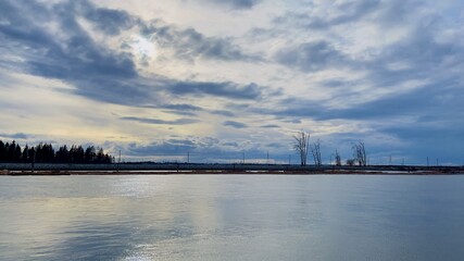 Obraz premium sunset over the river