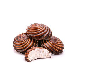 Chocolate-covered marshmallow close-up, isolated on a white background.Selective focus.