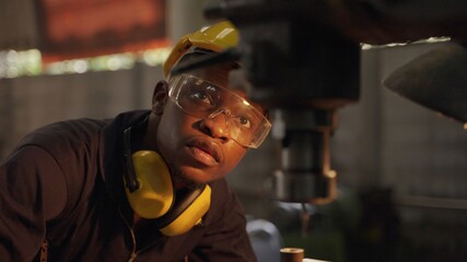 Professional Heavy Industry Engineer Worker Wearing Safety Uniform and Hard Hat, Engineer inspection checking work in the industry factory.