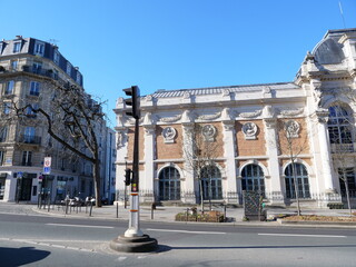 Fototapeta na wymiar The facade of some parisian building. Paris, march 2021.