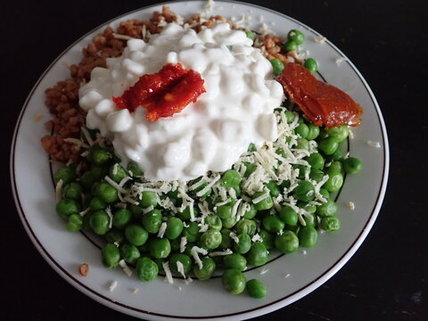 warm salad with buckwheat tnd green peas