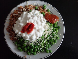 warm salad with buckwheat tnd green peas