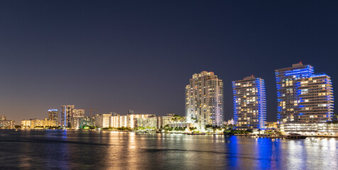Florida Miami night city skyline. USA downtown skyscrappers landscape, twighlight town.