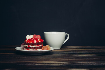 Round red cake on a plate marmalade sweets dessert