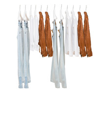 Elegant and trendy clothes for women hanging.