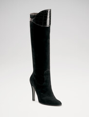 Fashionable women boots for all seasons. Studio shoot