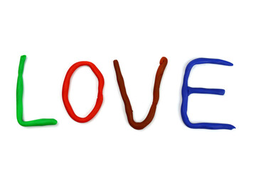 word love, made of colored plasticine. Isolated on white