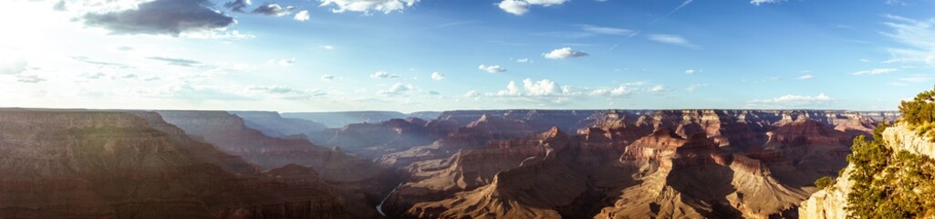 Mountains, hills and canyons of Grand canyon national park in mornign haze and sunshine, america