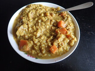 thick indian lentil soup with vegetables