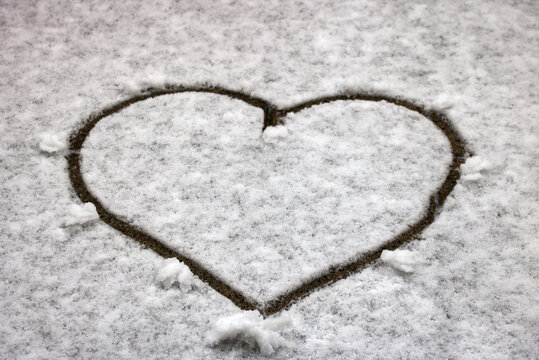 heart painted in snow winter