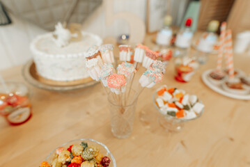 cake and various sweets on the kitchen table