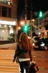 lonely girl walks in the city at night city photo shoot