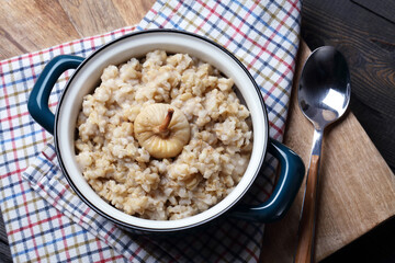 Homemade rustic oatmeal with sun dried figs