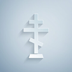 Paper cut Christian cross icon isolated on grey background. Church cross. Paper art style. Vector.