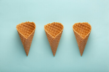 Minimalistic Easter concept with Easter eggs in waffle cones