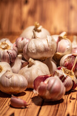 white garlic on wooden table