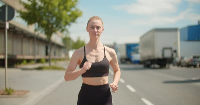 Caucasian woman exercising in a sportspark
