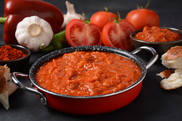 Matbucha - Moroccan Tomato dip, spread or condiment - Cooked Spicy Tomatoes, Peppers, Garlic and Chili Pepper