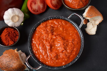 Matbucha - Moroccan Tomato dip, spread or condiment - Cooked Spicy Tomatoes, Peppers, Garlic and Chili Pepper