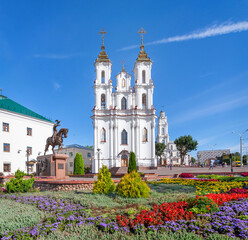 Viciebsk, Belarus. View of Voskresenskaya church with flowers on foreground