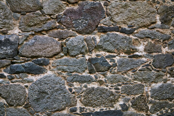 background, texture - ancient masonry at the wall of the castle