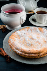 pie with cottage cheese and icing sugar on wooden background, cottage cheese pie