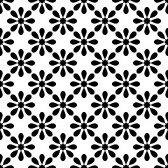 Seamless black and white vector pattern with decorative tile white print on black background