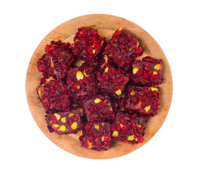 Turkish delight sweets on a wooden stand..