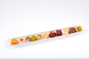 Turkish delight sweets in a white bowl..