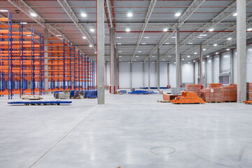 Interior of new large and modern warehouse space