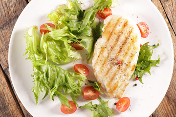 grilled chicken breast and lettuce