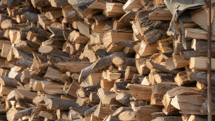texture of chopped firewood. woodpile with firewood
