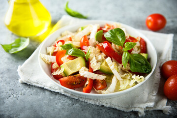 Healthy vegetable salad with cabbage and avocado