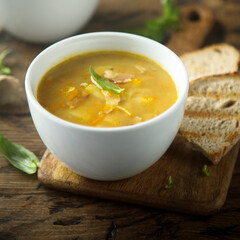 Homemade pea soup with smoked bacon