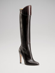 Fashionable women boots for all seasons. Studio shoot