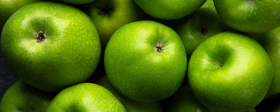 Ripe green apples background, panoramic image
