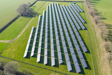Aerial view of solar panels at a solar farm in West Sussex England, clean renewable energy