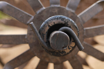 Some Photos of Old indian iron bullock cart in green farm. Vintage style iron bullock cart in rusty brown colour with pleasant sky.