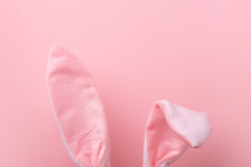 pink rabbit ears over pink background, minimal easter background