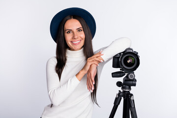 Photo of pretty sweet young woman wear casual outfit recording video modern camera smiling isolated white color background