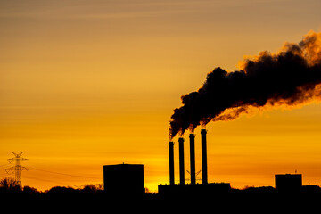 power station at sunset