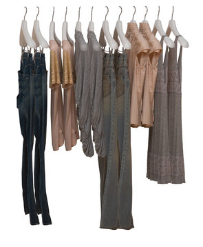 Elegant and trendy clothes for women hanging.