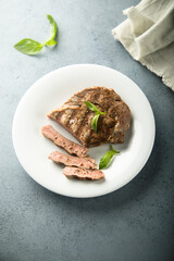 Grilled beef steak with fresh basil