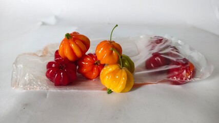 ceremai fruit (Eugenia uniflora) isolated on a white background. Indonesian typical fruit