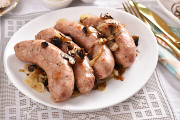 grilled sausage with onion and mushrooms as traditional Easter dish in Poland