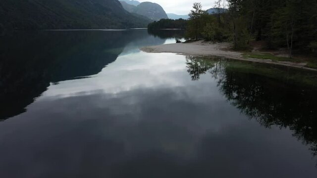 Flying over the beautiful lake Bohinj in Slovenia