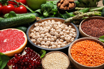 Fresh fruits and seeds, vegetables on table, closeup